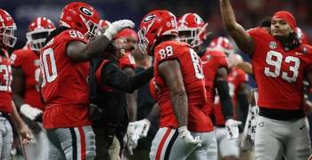 2022 College Football Playoff odds: Bettors hammering favored Michigan, Georgia on spread in New Year's Eve semifinals, history suggests blowouts
