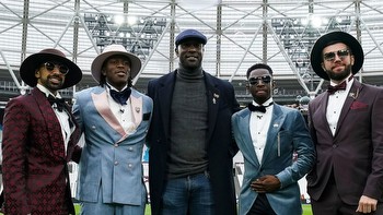 KSI looks dapper in suit and hat as he and Sidemen stars Tobi Brown, Joshua Bradley and Vikram Barn watch West Ham clash