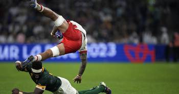 AP PHOTOS: Rugby World Cup quarterfinal race goes down to the wire for 6 of the 8 places