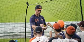 Astros coach Michael Collins coaching first base for Team Australia