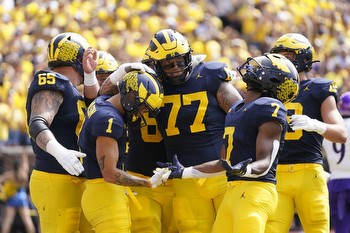 BetRivers code SPORTS for $500 when you bet on the Michigan football