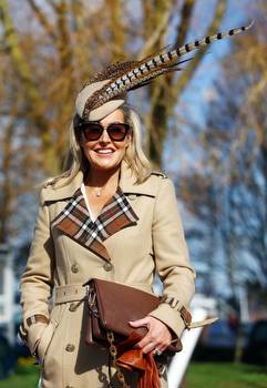 Carol Vorderman leads the way in a corset and leather pencil skirt at Cheltenham as racegoers glam up