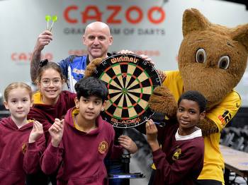 Children enjoy games as they learn more about maths through darts