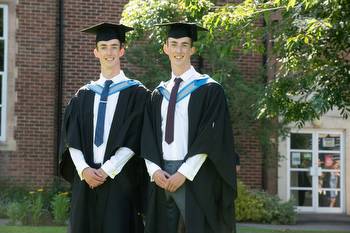Devon twins defy odds and graduate as doctors on same day