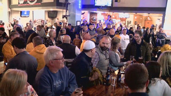 Fans celebrate the launch of sports betting on Asheville's biggest sports day
