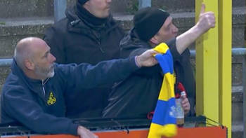 Fans claim ‘this is real football’ as they spot touching gesture between rival supporters mid-game