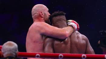 Francis Ngannou knocks down Tyson Fury, who survives split decision