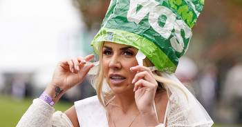 Grand National Ladies' Day sees racegoers use shopping bags to stay dry in rain and wind