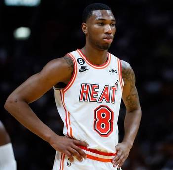 Heat re-sign Jamal Cain to his qualifying offer, a two-way contract