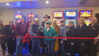 Horsemen cut ribbons to signify grand opening of two Derby Club locations