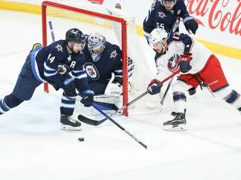 Jets escape with win over Laine, Jackets
