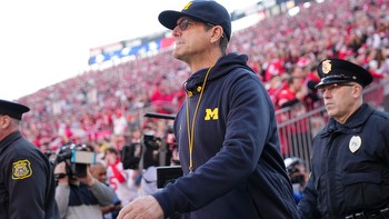 Jim Harbaugh misses first three Michigan games but Wolverines roll