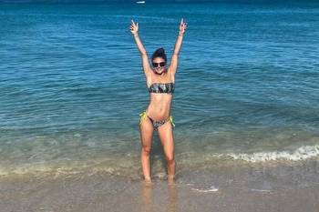 Megan Nicholls frolics in a bikini in Barbados as she celebrates retiring at 25
