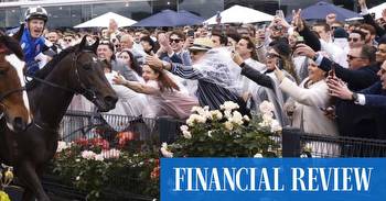 Melbourne Cup Day: Flemington flooded by Cup Day desperados