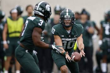 Michigan State football vs. Maryland picks and parlays for Saturday