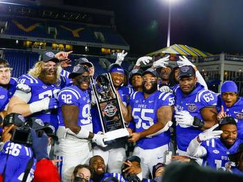 MILITARY MAYHEM: Leonard leads the way as Duke football runs away from UCF to win Military Bowl