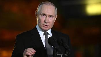 Putin accuses IOC of using Olympics for politics and racism after Russia is banned from the Games