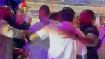 Shocking moment huge brawl breaks out at F1 party in Abu Dhabi as bottles of prosecco are launched at spectators