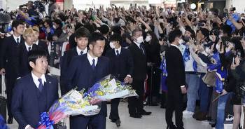 Soccer: Japan's World Cup team gets heroes' welcome back home