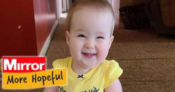 Toddler born with spinal condition defies the odds by learning to walk