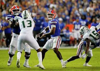 USF botches late FG, No. 18 Florida gets 31-28 win in Swamp
