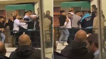 Watch brawl erupt as punters punch police after winning horse is relegated to second