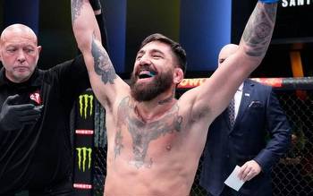 Why did Argentinian UFC fighter Guido Cannetti choose to receive his salary in USDC stablecoin?