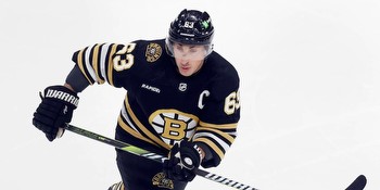 Will Brad Marchand Score a Goal Against the Red Wings on December 31?