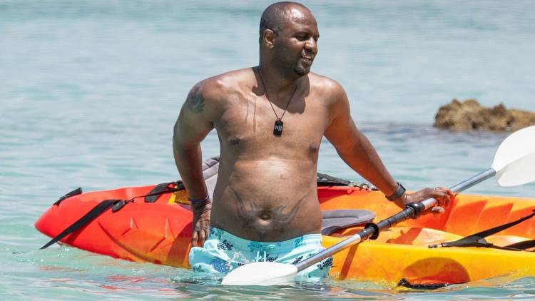 Arsenal legend Patrick Vieira shows off belly tattoo as he relaxes in Barbados amid talk of return to Premier League