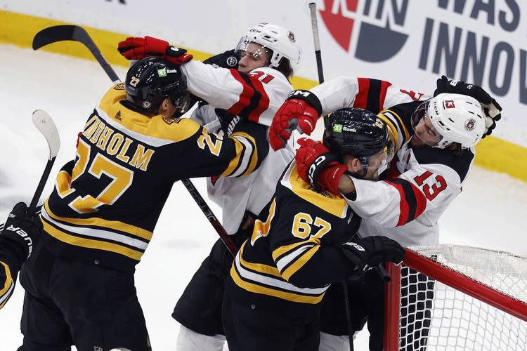 Bruins match NHL wins record, beat Devils, 2-1 for 62nd victory