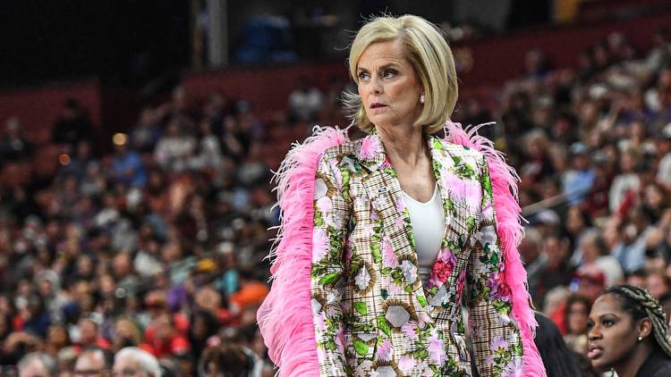 Cubs fan wears Kim Mulkey's feathered jacket to game at Wrigely Field