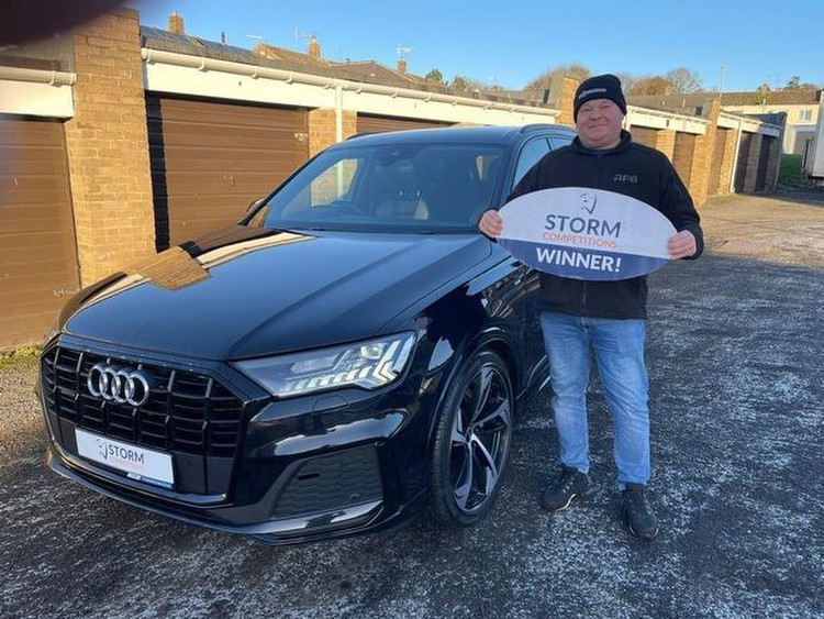 Dad left stunned after winning Audi and Mercedes worth £80K for Christmas