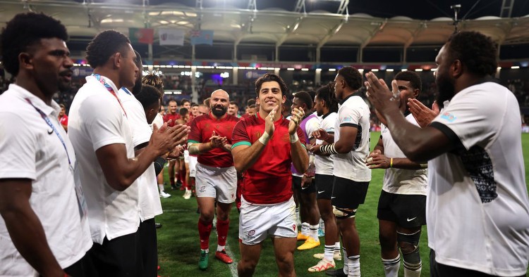 Fiji advance to face England in Rugby World Cup quarter-final despite shock loss to Portugal