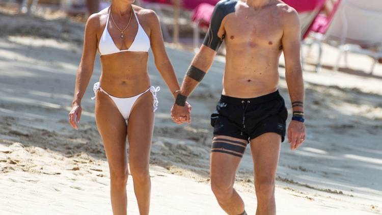 Joe Hart holds hands with wife Kimberly as ex-England star enjoys holiday in Barbados during the World Cup