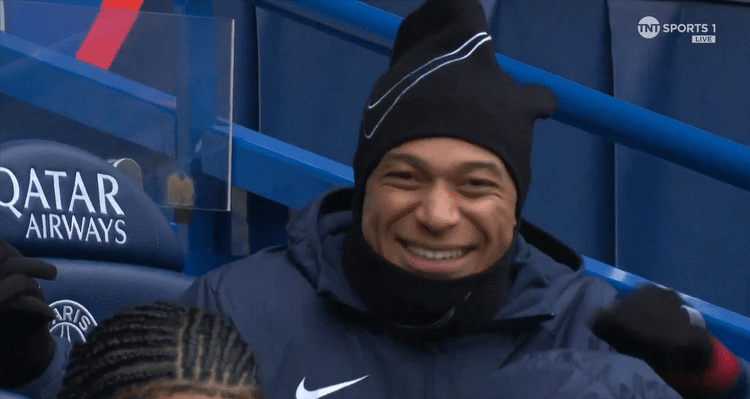 Kylian Mbappe seen laughing on the bench as he's dropped again