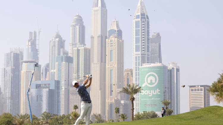 McIlroy comes through 'battle' to edge bitter rival Reed in Dubai