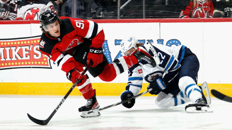 Dawson Mercer of the New Jersey Devils skates against the Winnipeg Jets. Photo by Getty Images.