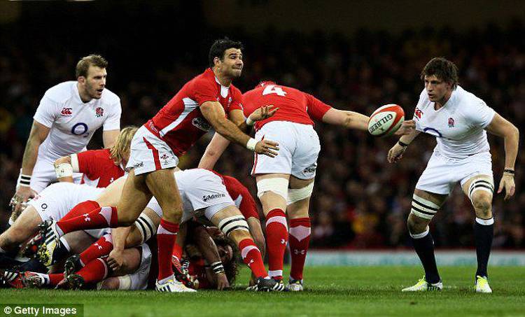 Demolished: Wales beat England 30-3 in Cardiff to win the Six Nations crown in 2013