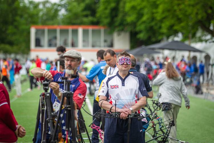 Vision and hearing-impaired archer strikes bullseye against all odds